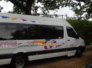 The school bus gives a toot on the horn to signal it's arrival 