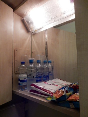 Breakfast and refreshment supplies in the cupboard above the washbasin