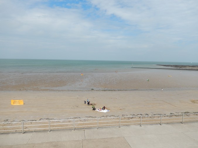 But can you see where those flags are?  Look closely - the tide has gone out again and they are stuck high and dry in the sand!