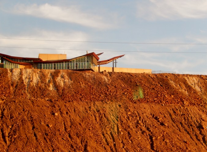 The Broken Hill railway station is overlooked by the miners' memorial at the top of the slag hill