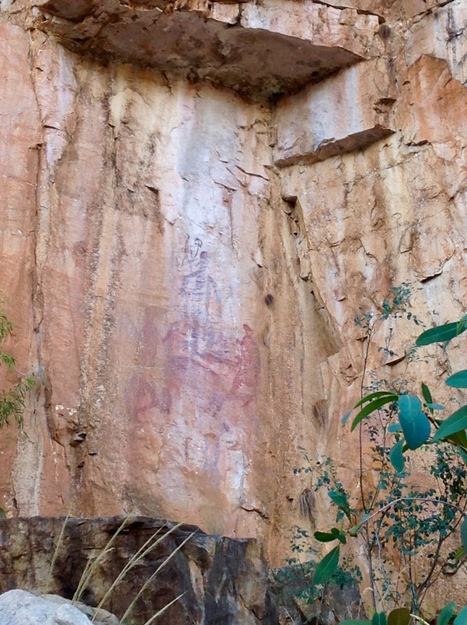 Ancient Aboriginal Rock Painting high up a cliff wall