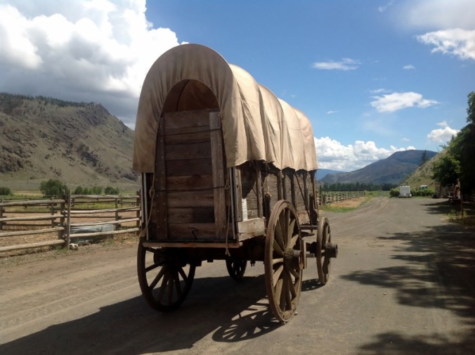 Covered Waggon - enlarge the photo to see the modern version in the background!